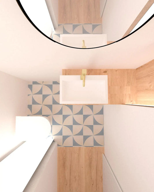 baldosa hidráulica mosaico semicirculo diseño floral blanco roto y azul grisáceo en baño